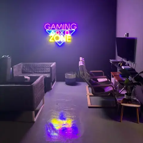 The gaming corner under the neon Gaming Zone sign.